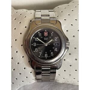 SWISS ARMY Ladies Watch 100 MTR Water Resident Black Face. Needs Battery